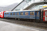 Der RhB Gourmino Speisewagen WR 3810, ex RhB Dr4� 3810, ex Mitropa Dr4� 10, am 17.02.2017 im Bahnhof Chur.