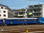 Der RhB Gourmino Speisewagen WR 3811, ex RhB Dr4� 3811, ex Mitropa Dr4� 11, am 22.03.2023 beim Bahnhof Chur abgestellt.